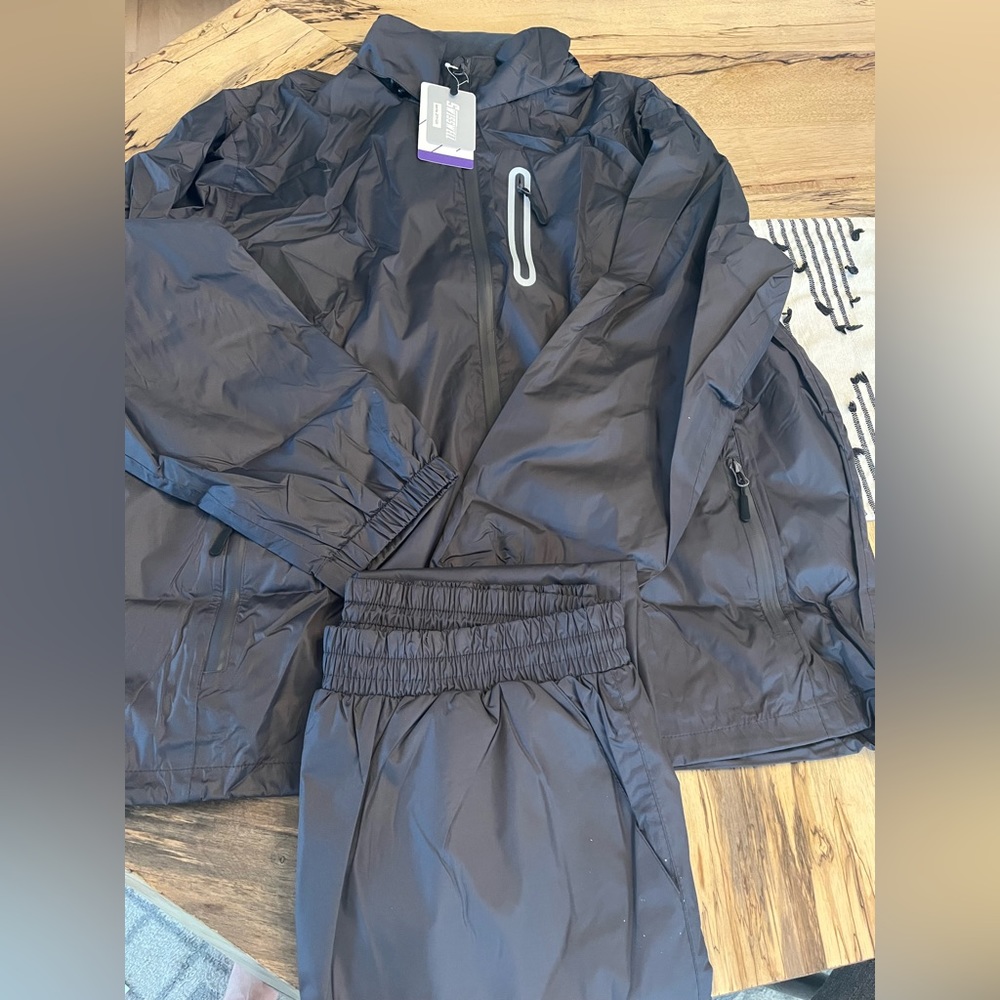 Mens rain wear. New with tags. Swisswell brand size 2xl, rain jacket and pants.
